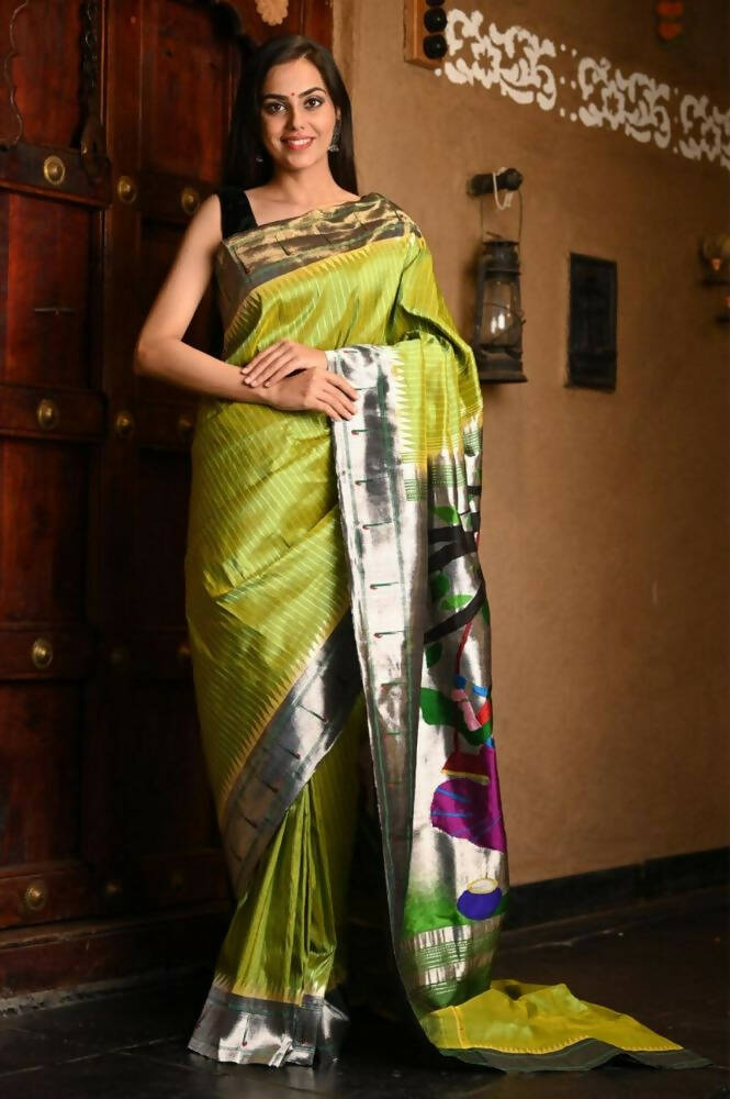 Very Much Indian Premium Handloom Pure Silk Muniya Borde-Parrot Green,Silver Zari And Intricate Big Radha Krishna Pallu