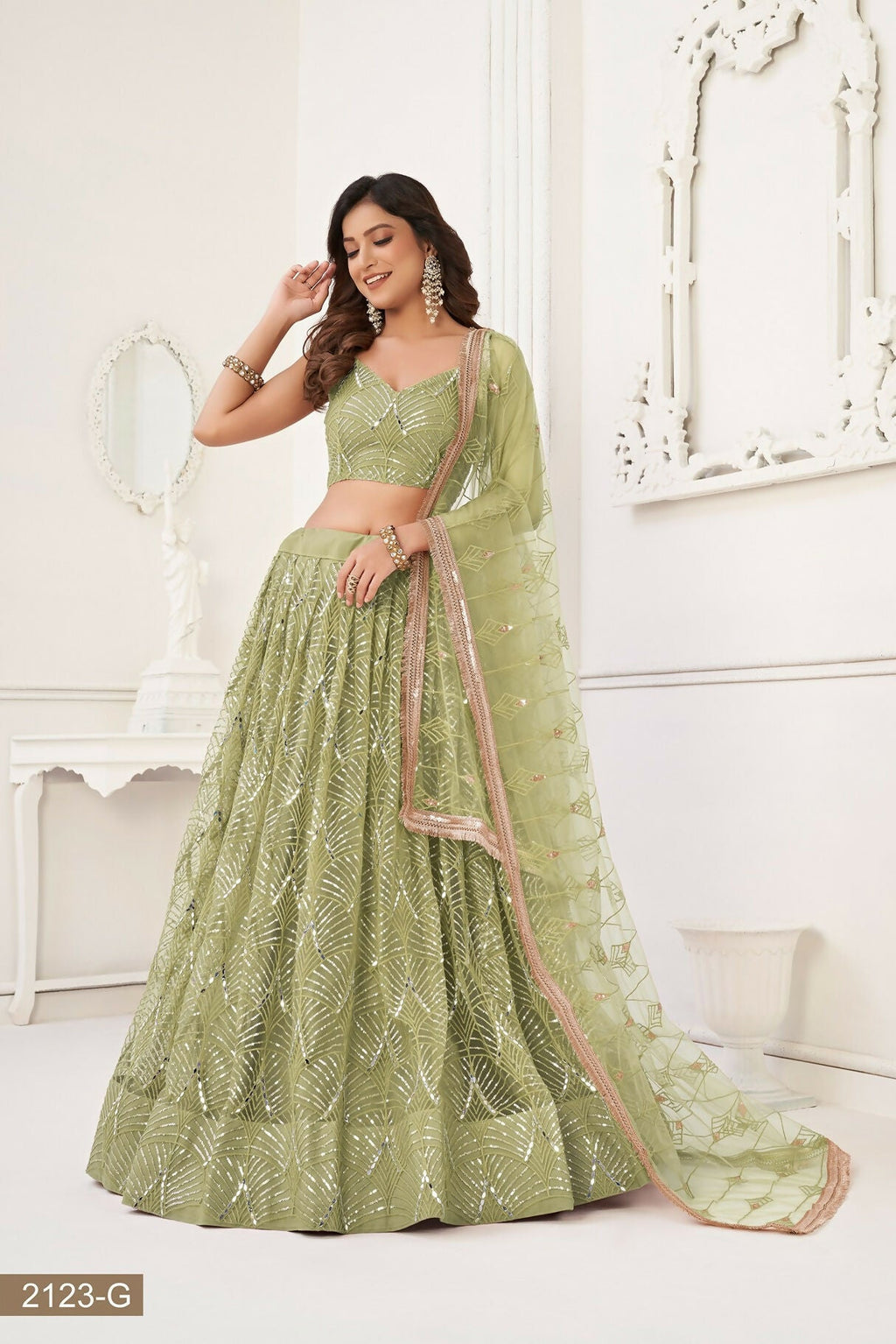 Eilara Glamorous Pista Green Net With Sequins And Thread Embroidery Real Mirror Work Lehenga Choli For Wedding