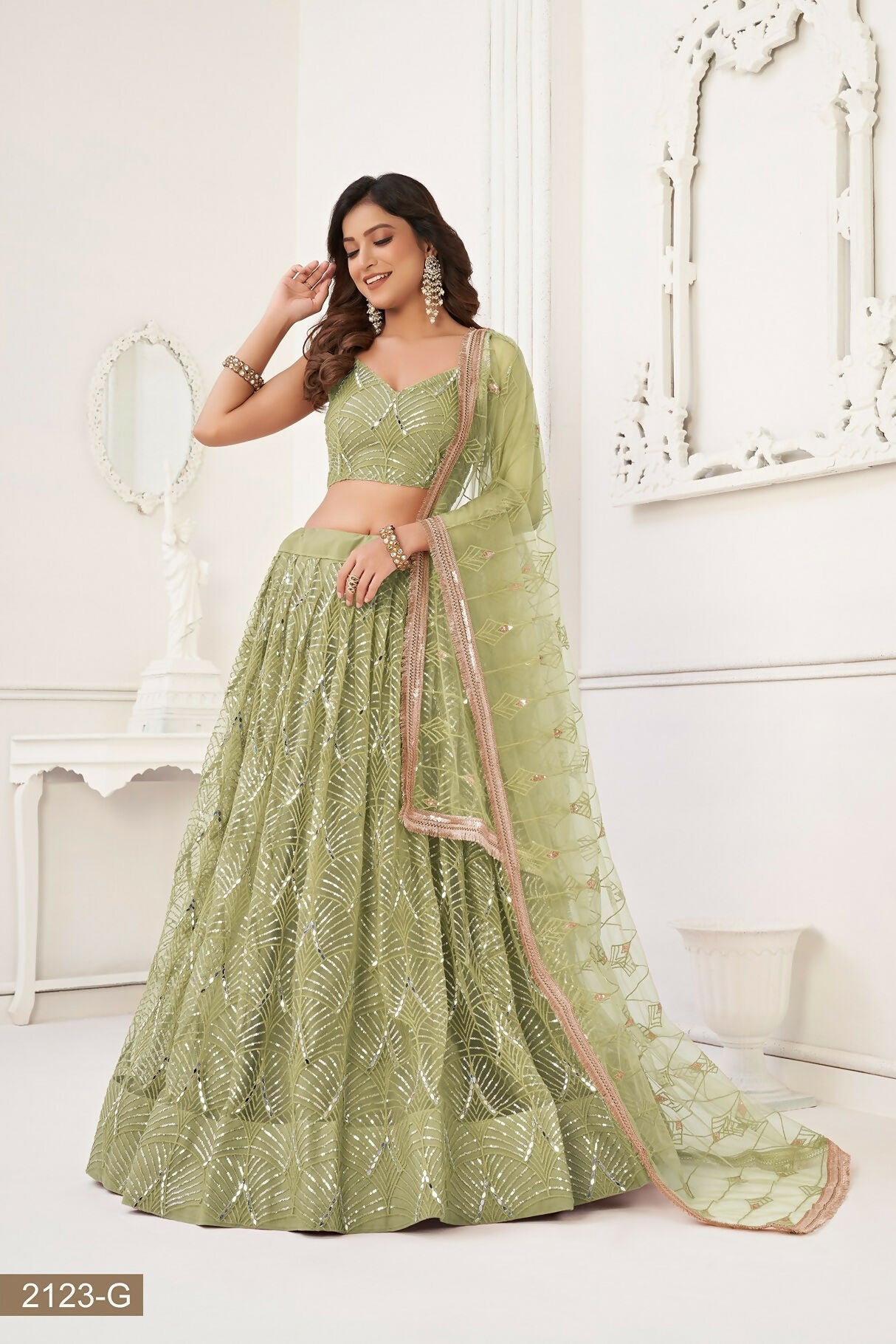 Eilara Glamorous Pista Green Net With Sequins And Thread Embroidery Real Mirror Work Lehenga Choli For Wedding