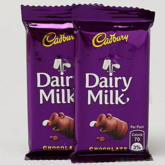 Ethnic Om Metal Rakhi & Dairy Milk Chocolates