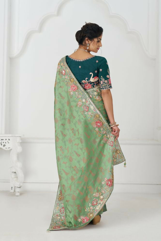 Kesar Fab Green Net Embroidered Lehenga