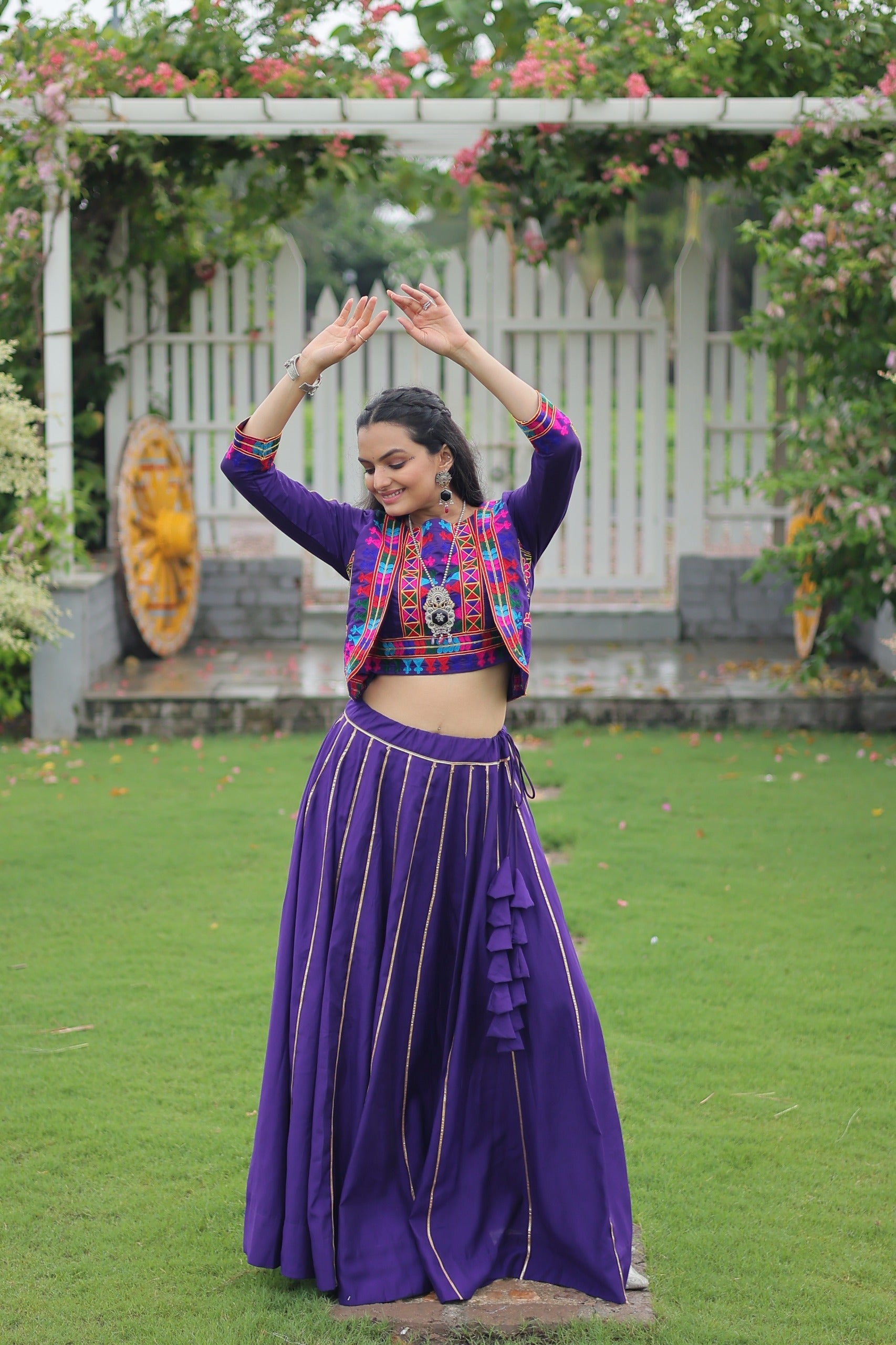 Evanik Navratri Purple Roamn Fabric With Kutchi Work Koti Style Blouse Stitched Lehenga Choli