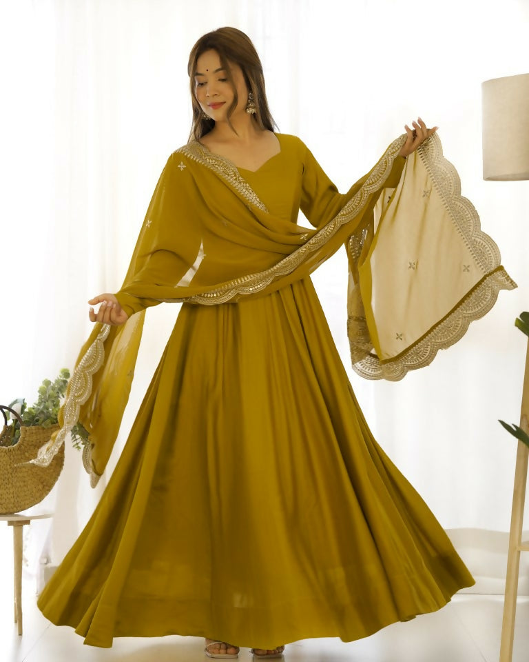 Teeya Creation Mustard Color Pure Roman Silk Chanderi Party Wear Fully Stitched Gown