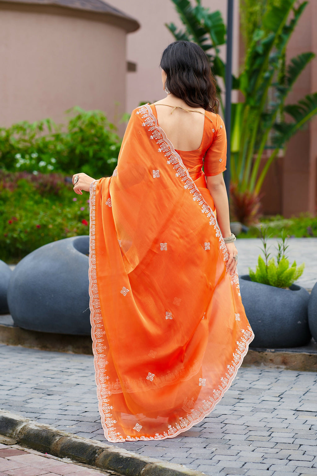 Vastranavya Orange Embroidery Work Shimmer Chiffon Saree with Unstitched Blouse