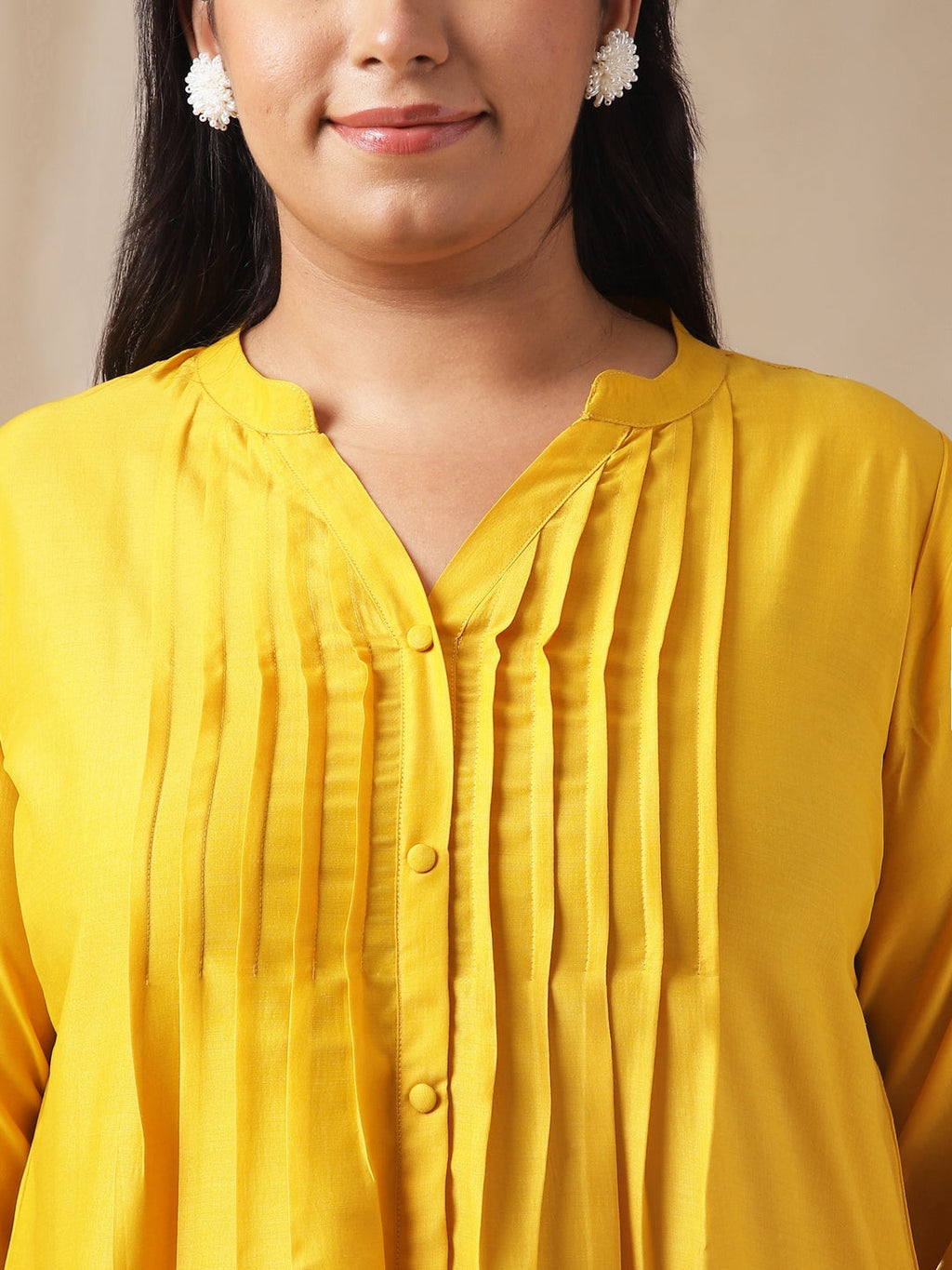 Janasya Pleated Muslin Yellow Solid Band Collar Kurta Set