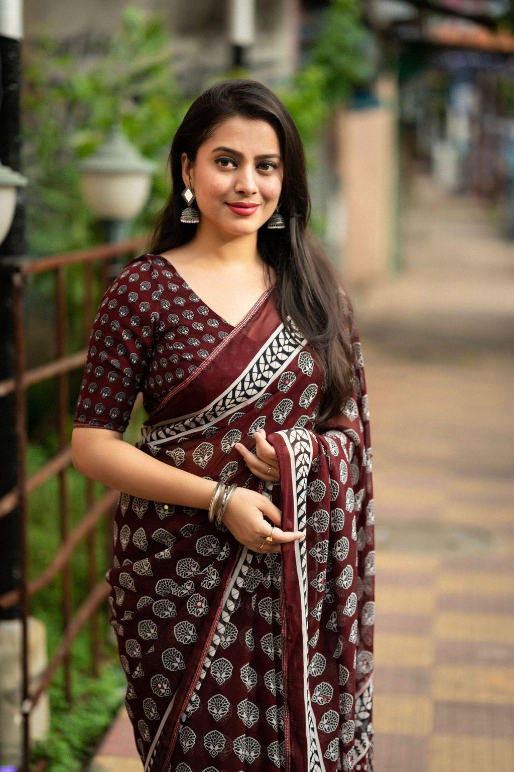 Maroon Poly Georgette Ajrak Saree with Unstitched Blouse - Hiral Fashion