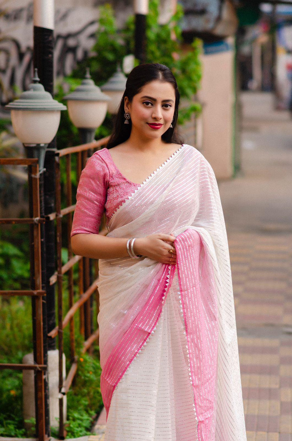 Pink Poly Chiffon Striped Saree with Unstitched Blouse - Hiral Fashion