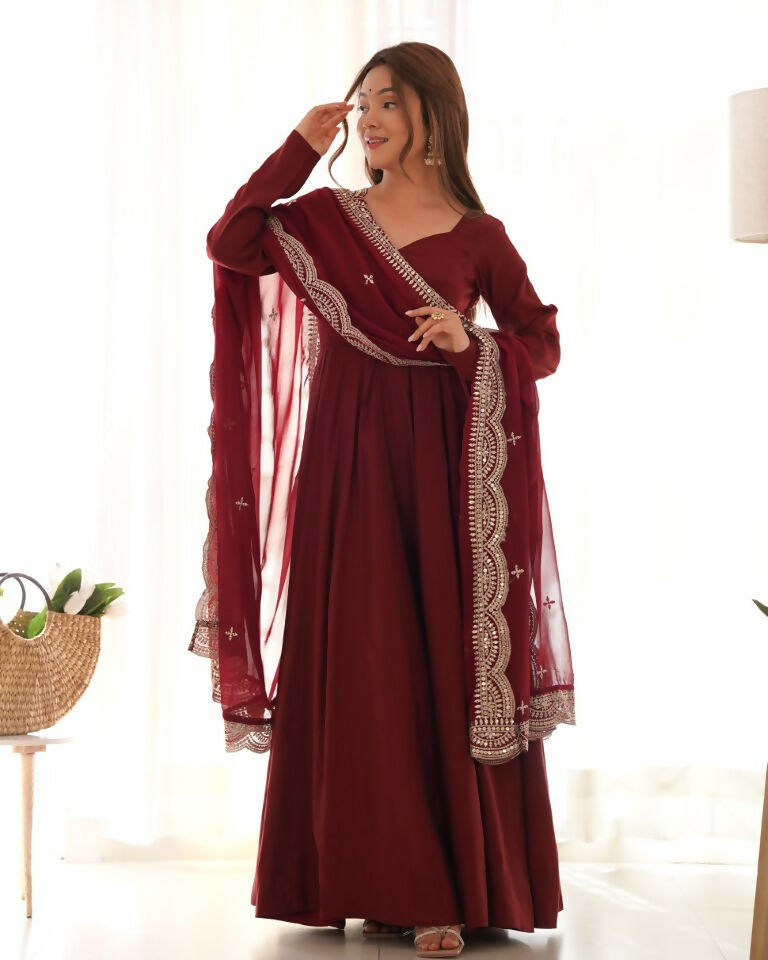 Teeya Creation Maroon Color Pure Roman Silk Chanderi Party Wear Fully Stitched Gown