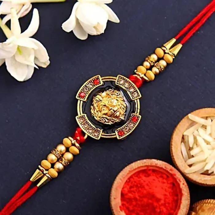Traditional Lion Face Rakhi & Kaju Roll Box