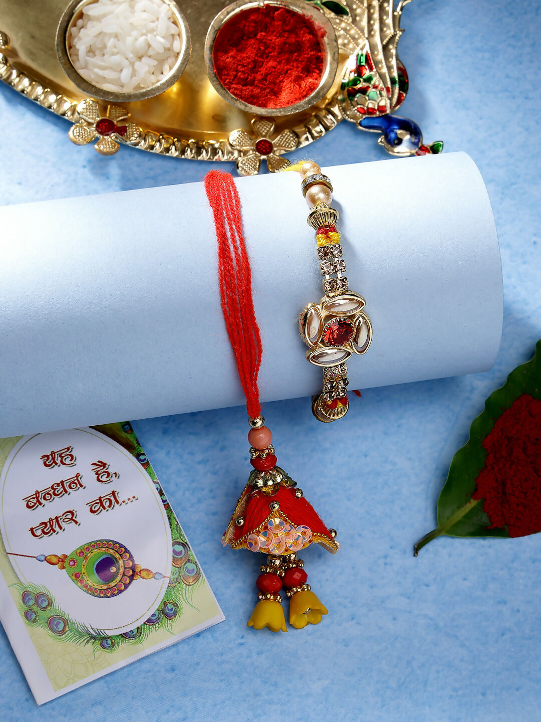 NVR Women & Men Set of 2 Red & Gold-Toned Stone-Studded Bhaiya Bhabhi Rakhi With Roli Chawal