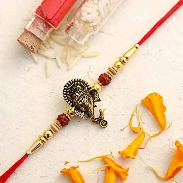 Lord Ganesha Rudraksha Rakhi & Kaju Roll Box