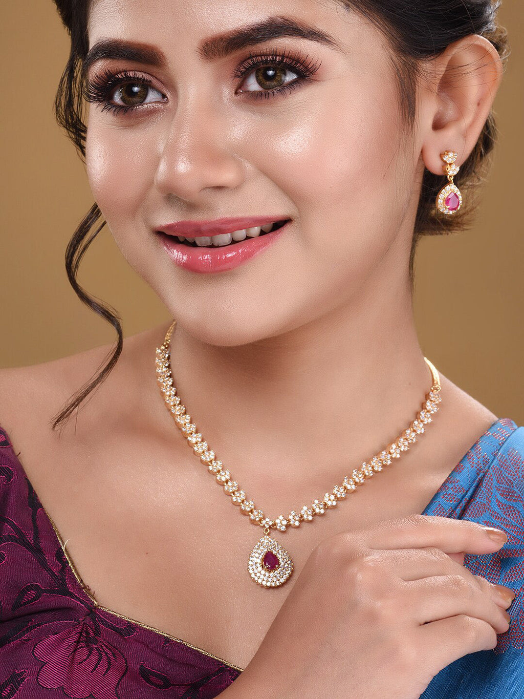 Saraf RS Jewellery Gold-Polished White & Red American Diamond Studded & Beaded Handcrafted Jewellery Set