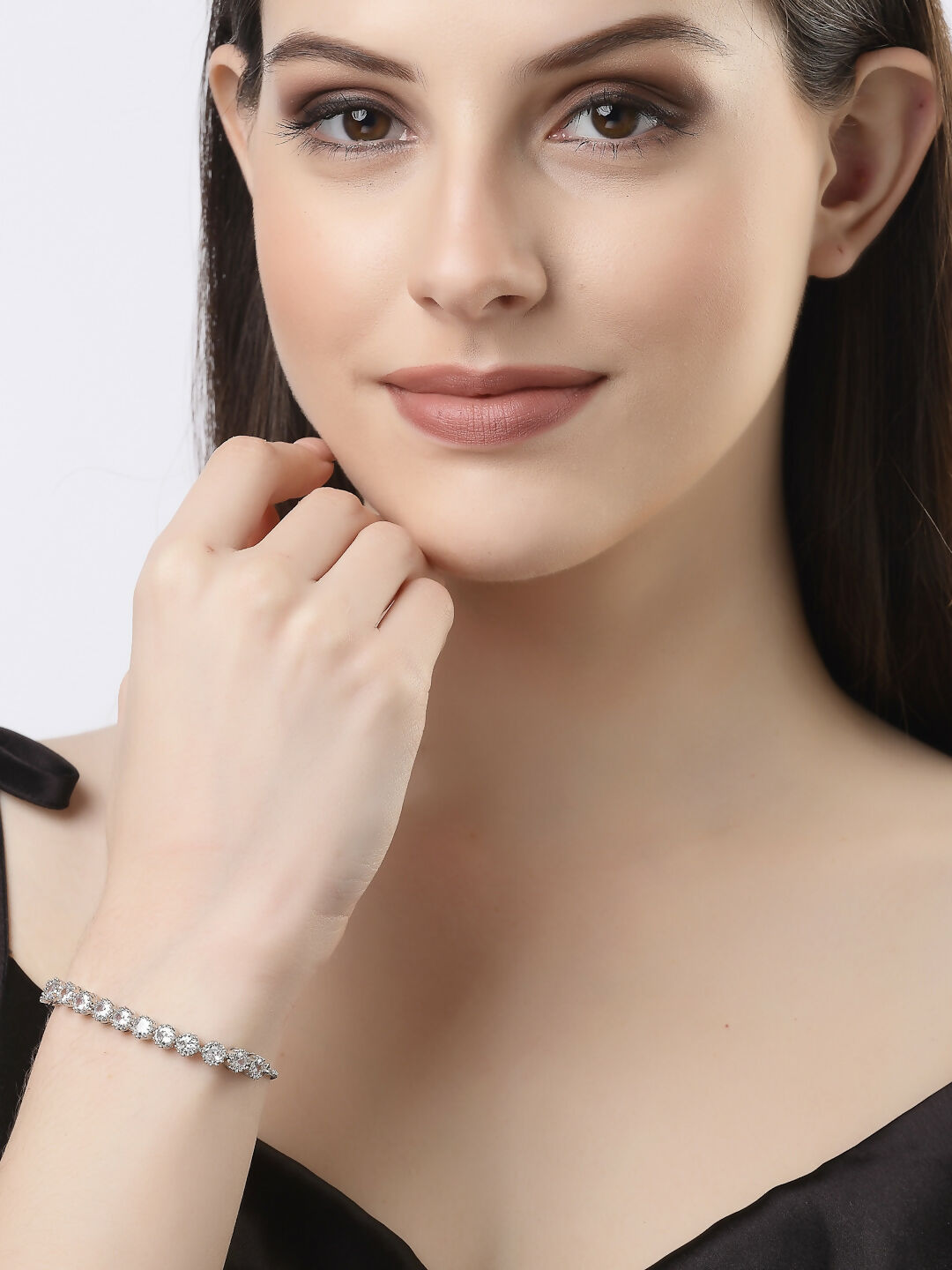 NVR Women Silver-Plated Handcrafted American Diamond Link Bracelet