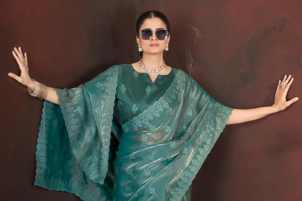 Vastranavya Teal Jimmy Choo Silk 3mm Sequence work with Cross Stitch Embroidery work & Cutwork Border Saree
