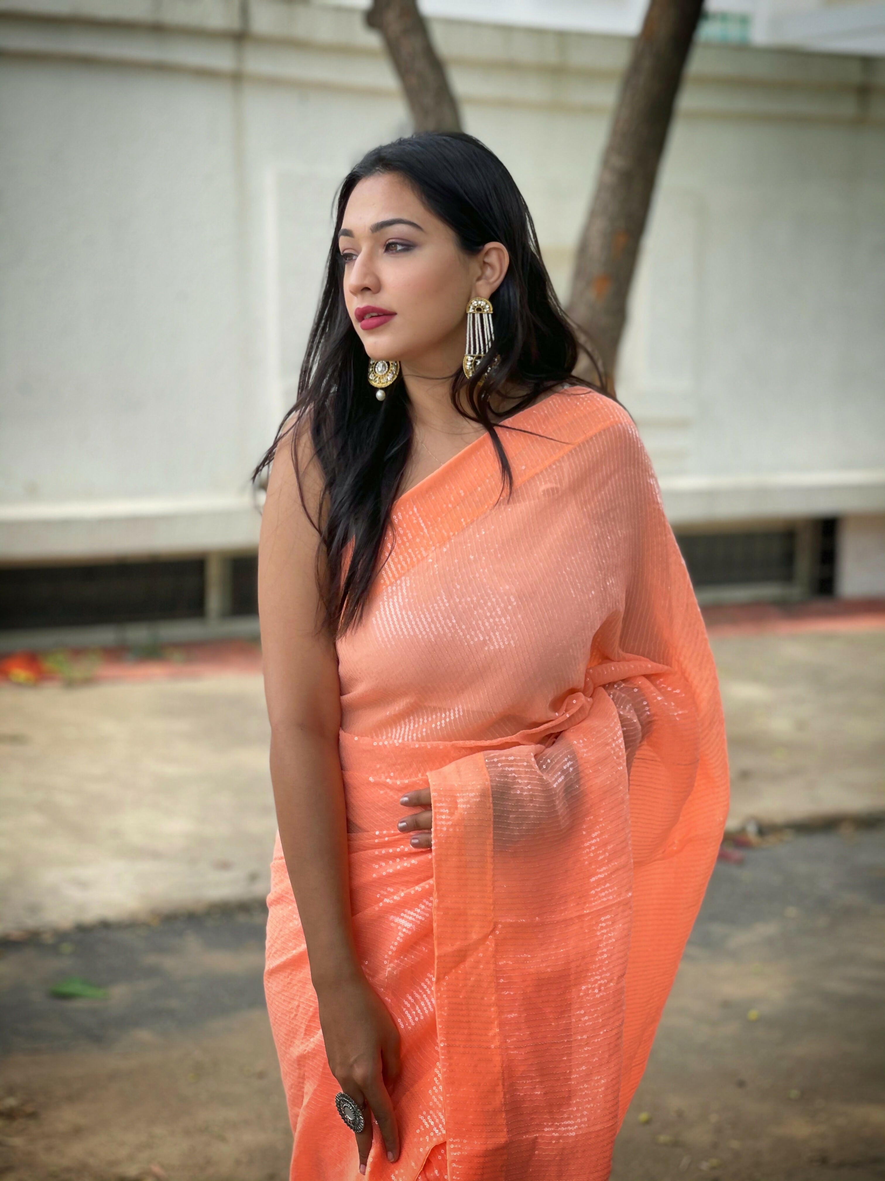 Vamsee Solid Color Sea Orange Georgette Saree