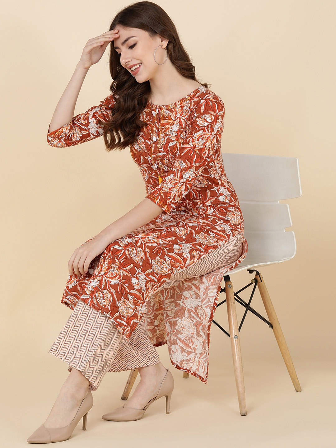 HERE&NOW Women Brown Floral Printed Sequinned Kurta with Trousers