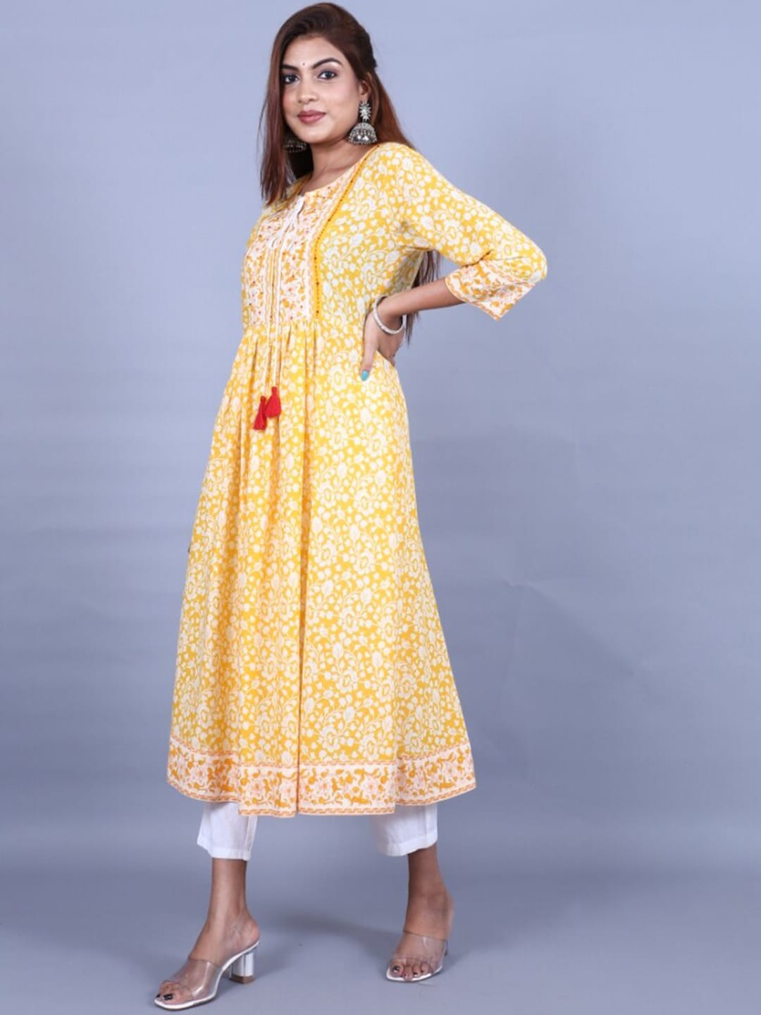 HERE&NOW Women Yellow Floral Printed Sequined A-Line Kurta with Trousers