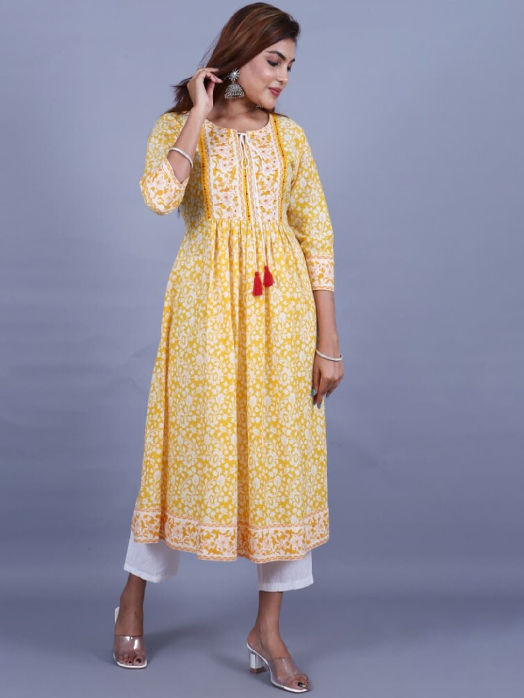 HERE&NOW Women Yellow Floral Printed Sequined A-Line Kurta with Trousers