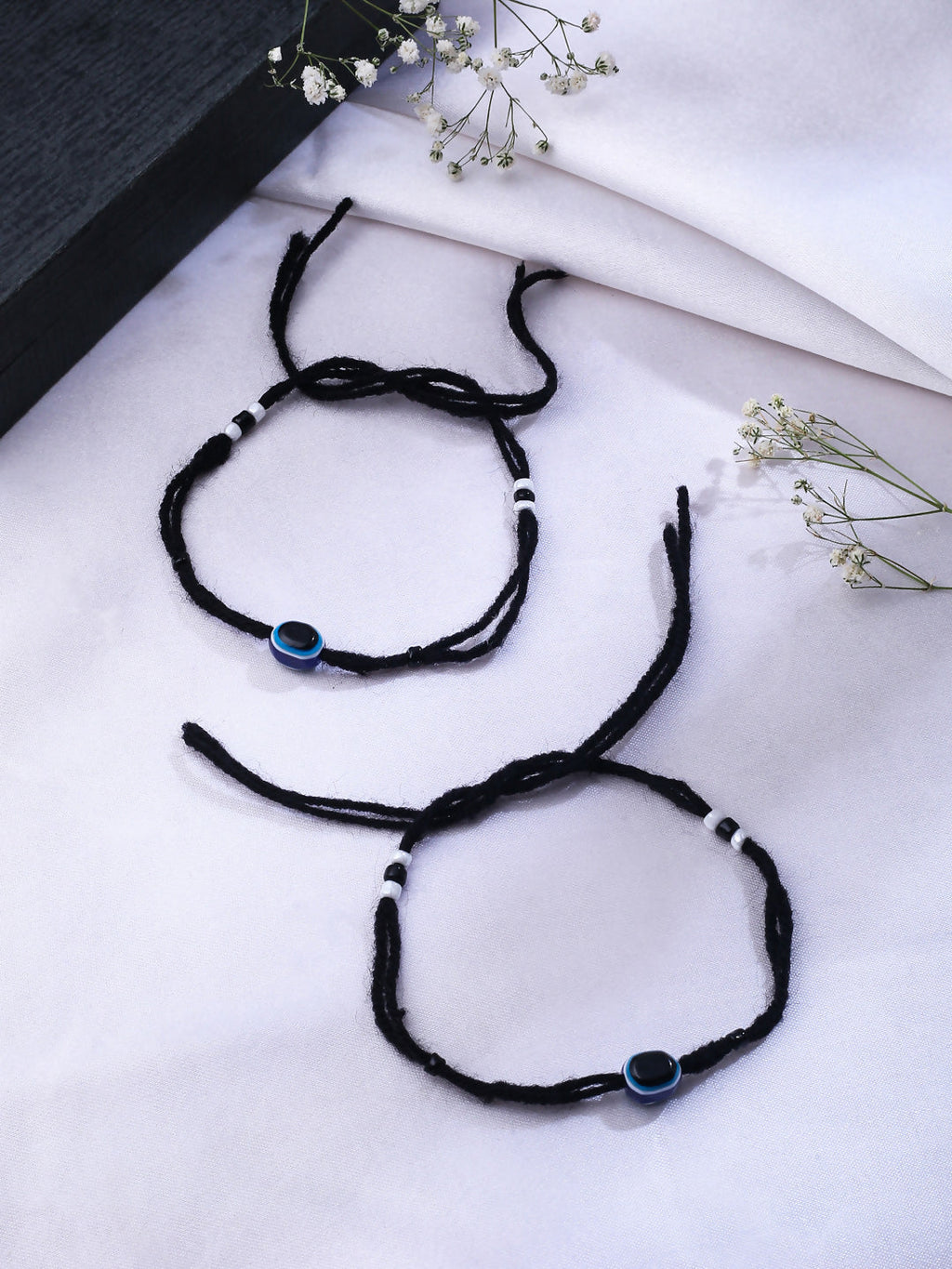 NVR Women & Men Set of 2 Black Evil Eye Rakhi With Roli Chawal