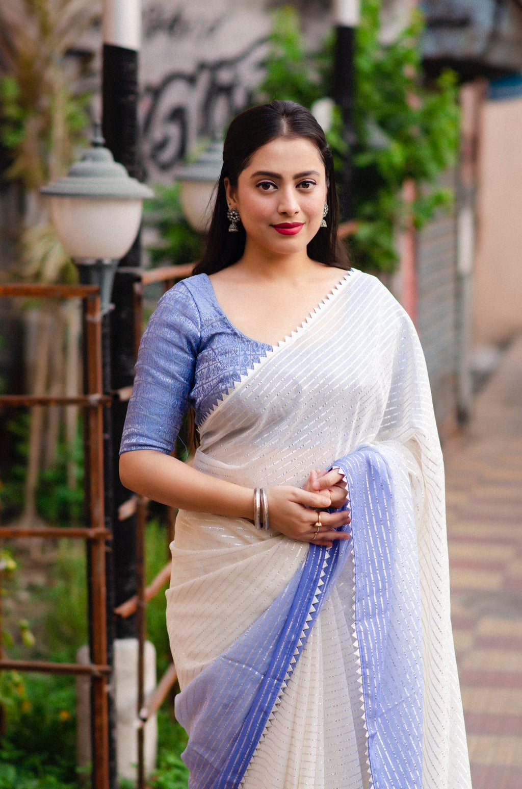 Lavender Poly Chiffon Striped Saree with Unstitched Blouse - Hiral Fashion