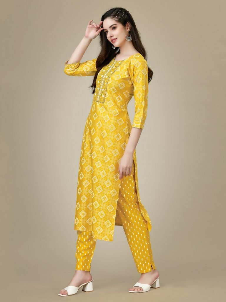 Jyoti Fashion Women's Yellow Rayon Embroidered Kurta Pant Set