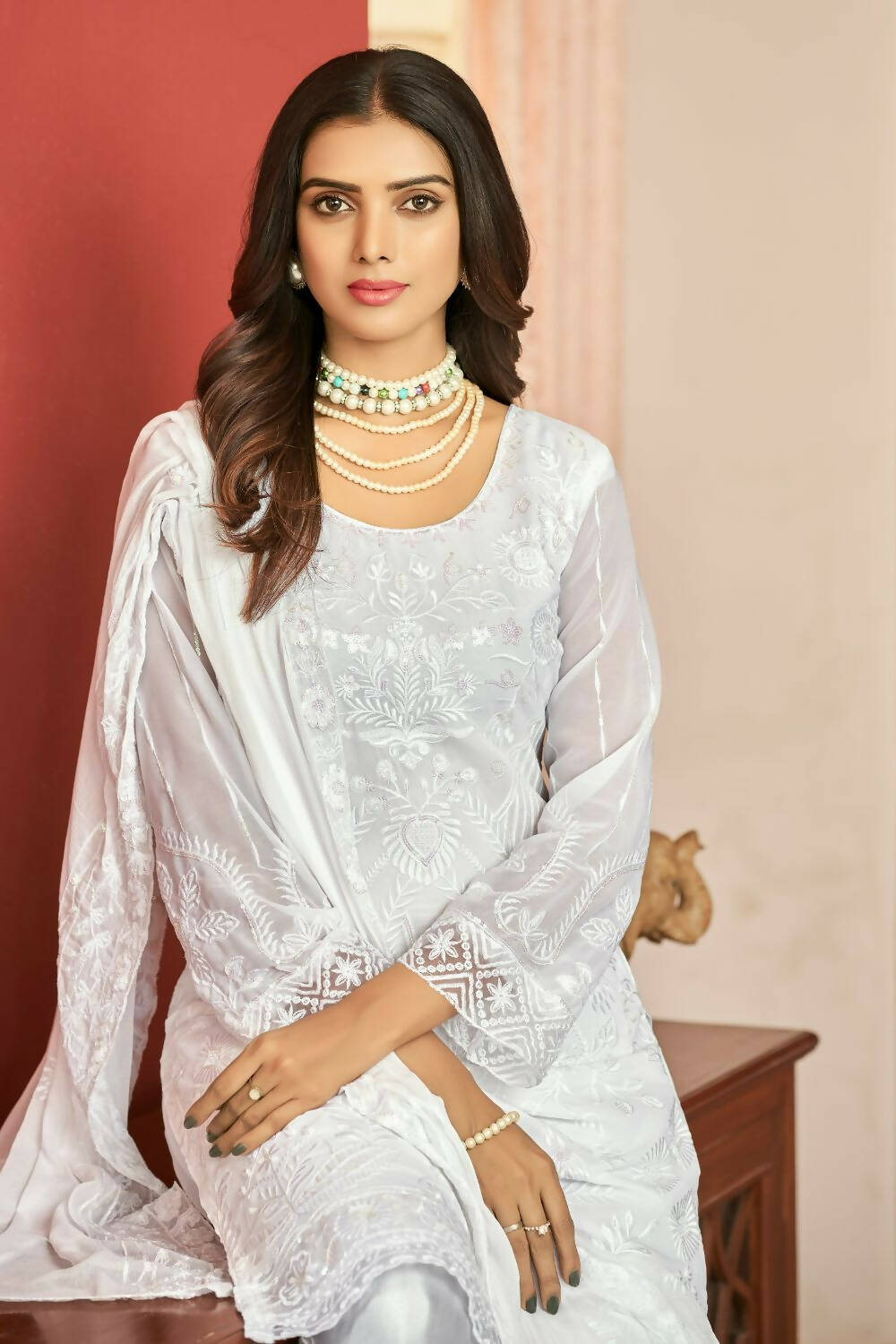White Heavy Faux Georgette Embroidered Semi Stitched Suit - Dhvani