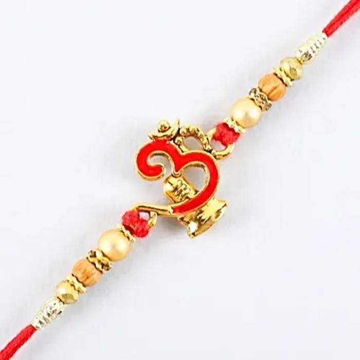 Auspicious Om Pearl Rakhi & Kaju Roll Box