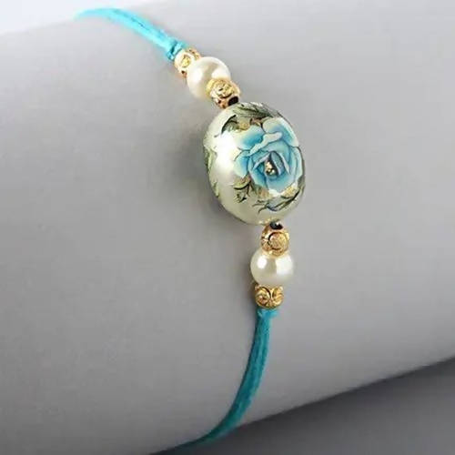 Rose Japanese Stone Rakhi & Kaju Rolls Box