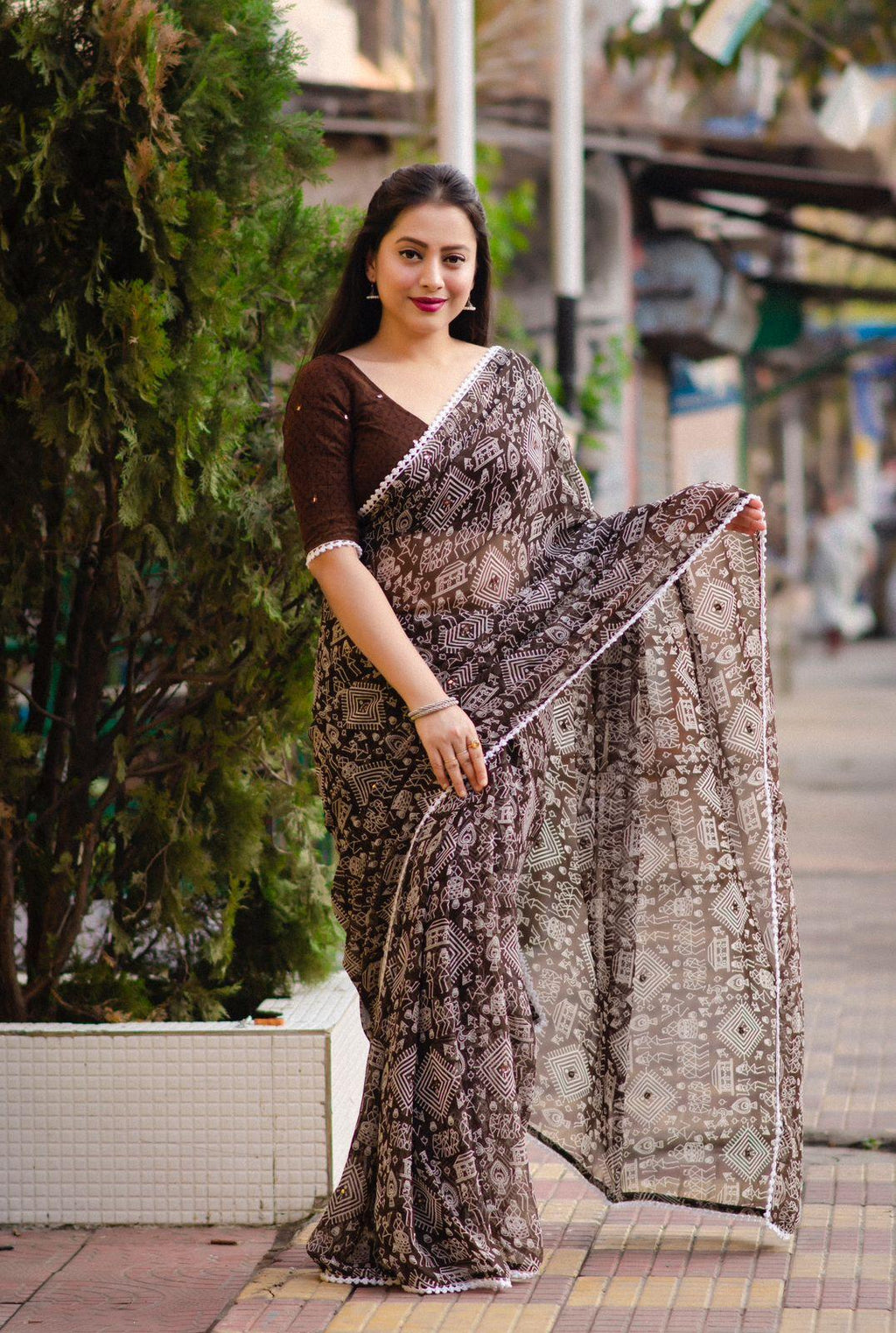 Coffee Poly Georgette Ethnic Motifs Saree with Unstitched Blouse - Hiral Fashion