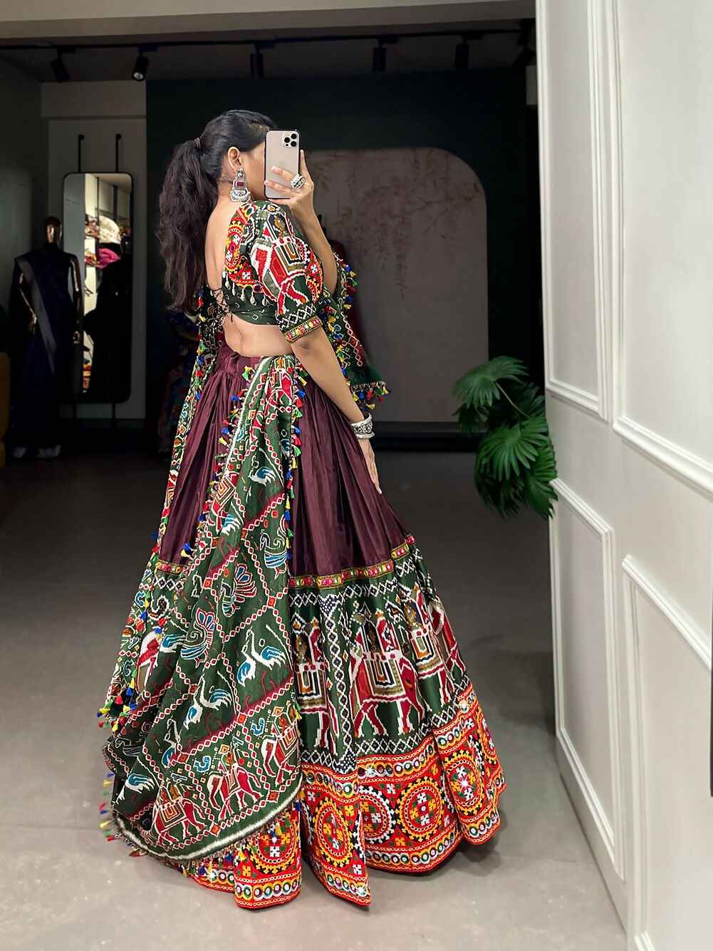 Vastranavya Navaratri Special Dola Silk Patola Print With Gamthi Work and Mirror Work Lace Border - Brown