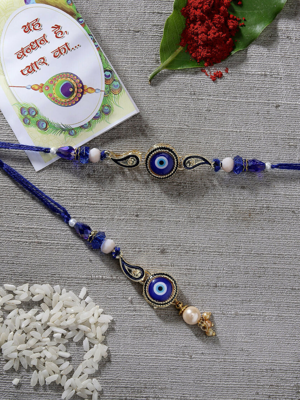 NVR Women & Men Set of 2 Blue Evil Eye Beaded Bhaiya Bhabhi Rakhi With Roli Chawal