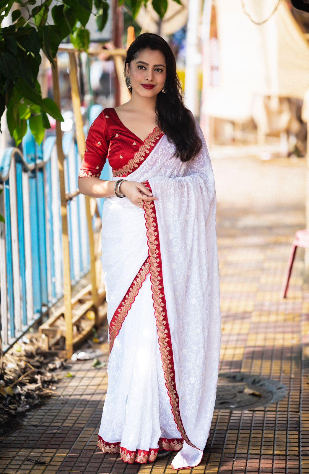 White Pure Georgette Woven Design Saree with Unstitched Blouse - A2M