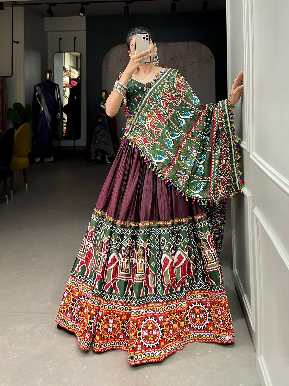 Vastranavya Navaratri Special Dola Silk Patola Print With Gamthi Work and Mirror Work Lace Border - Brown