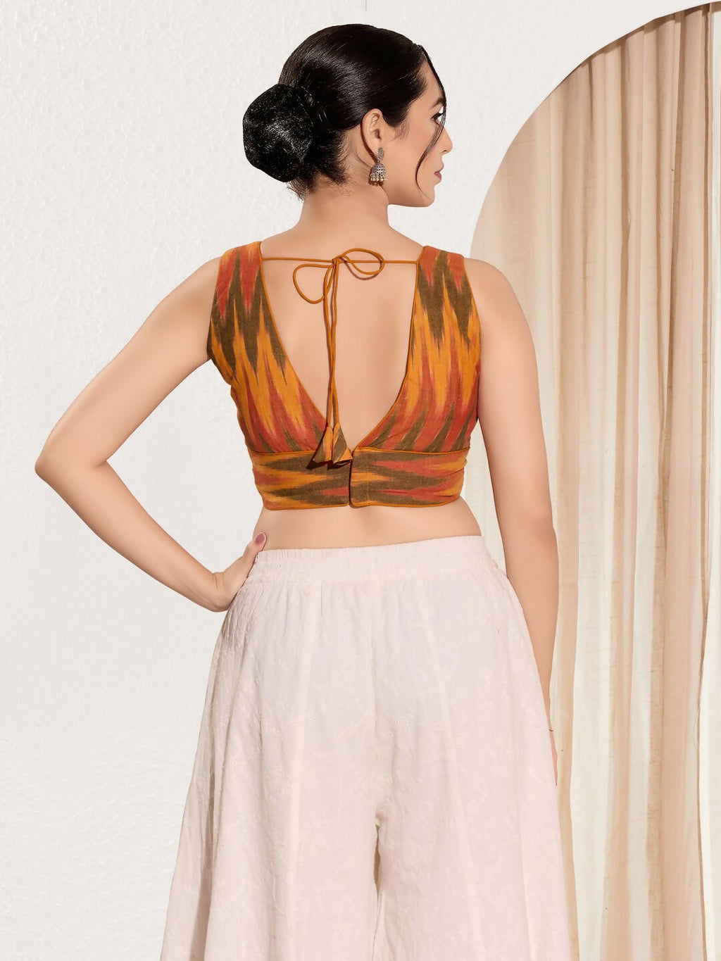Joban Fashion Mustard Ikat Silk Padded Blouse With V Neck Sleeveless