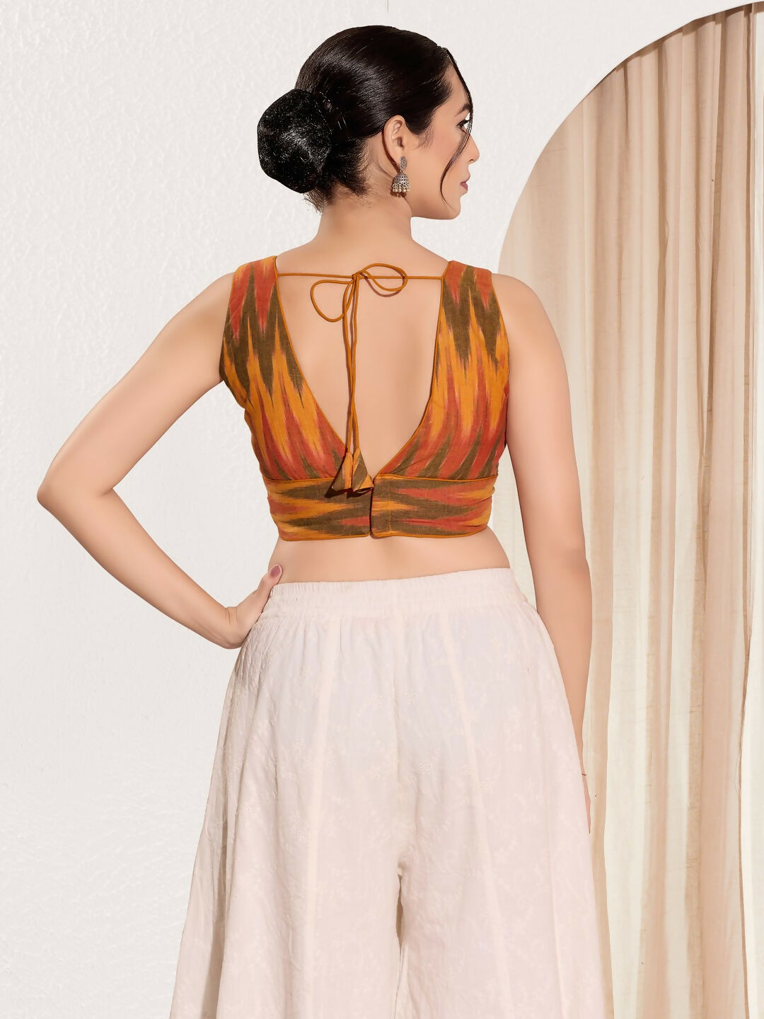 Joban Fashion Mustard Ikat Silk Padded Blouse With V Neck Sleeveless