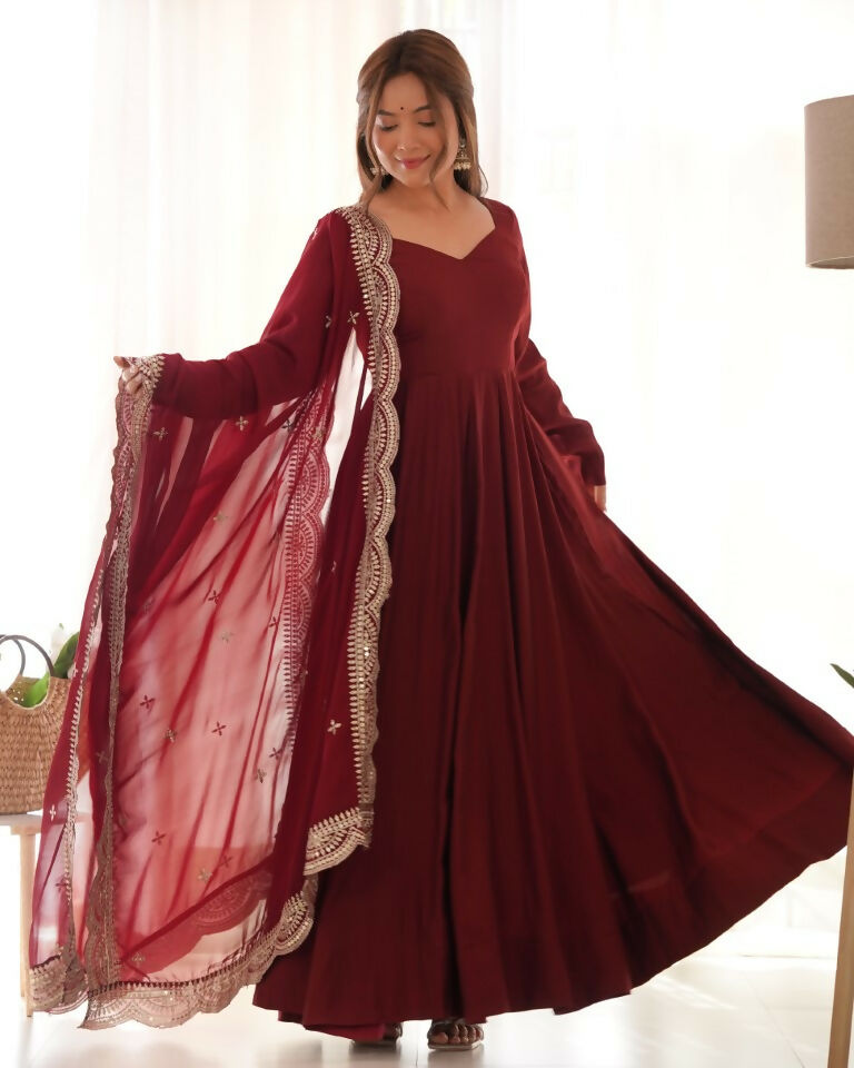 Teeya Creation Maroon Color Pure Roman Silk Chanderi Party Wear Fully Stitched Gown