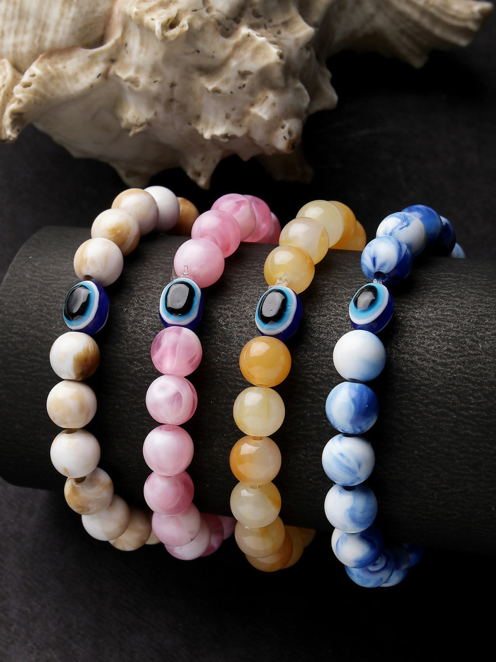 NVR Women & Men Set of 4 Multicolor Evil Eye Elasticated Rakhi With Roli Chawal