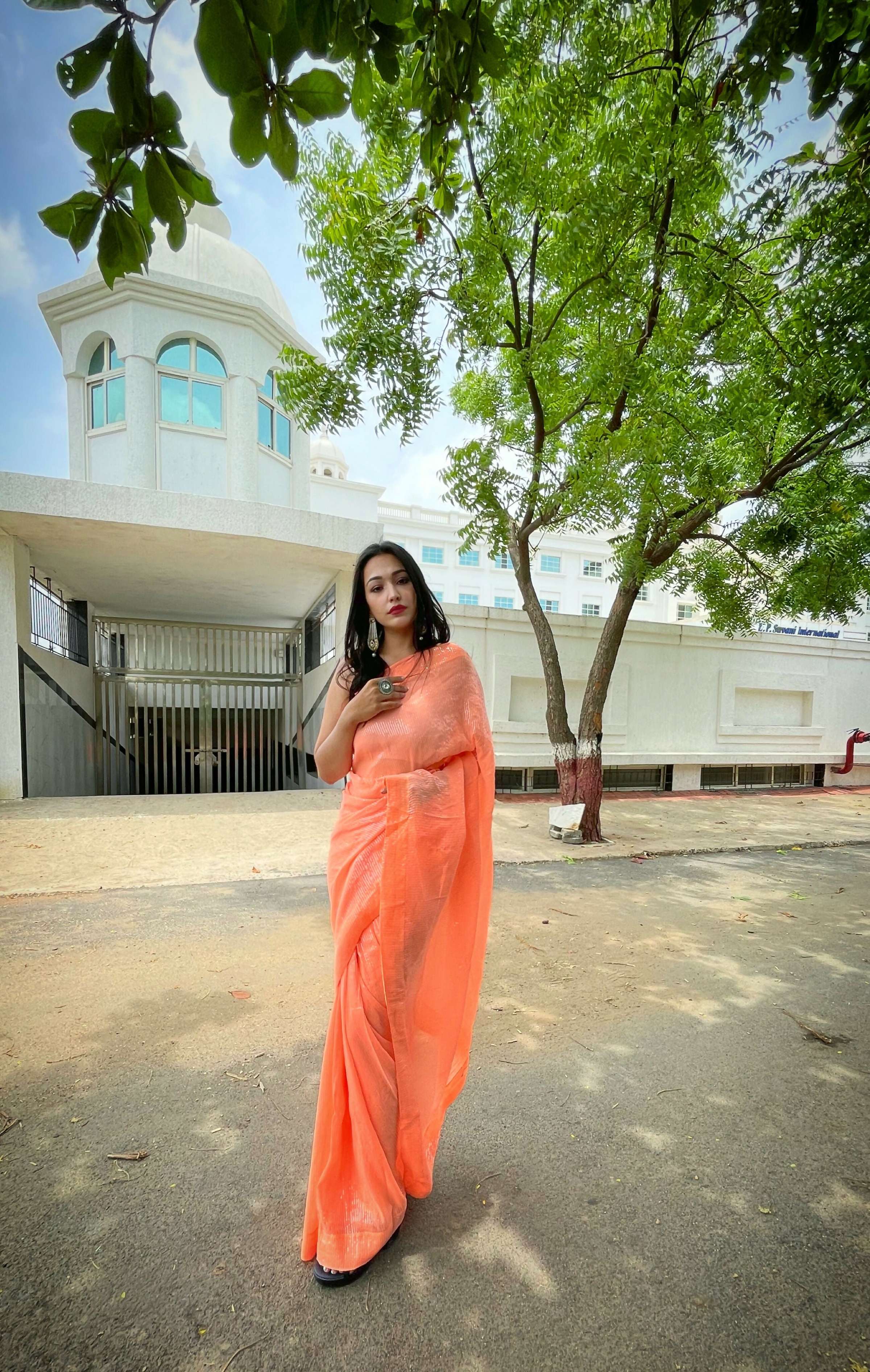 Vamsee Solid Color Sea Orange Georgette Saree