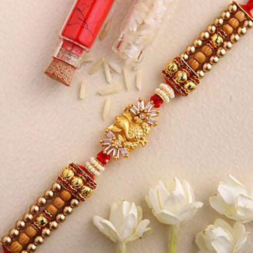 Ganesha Design Rakhi and Fruit N Nut Chocolates