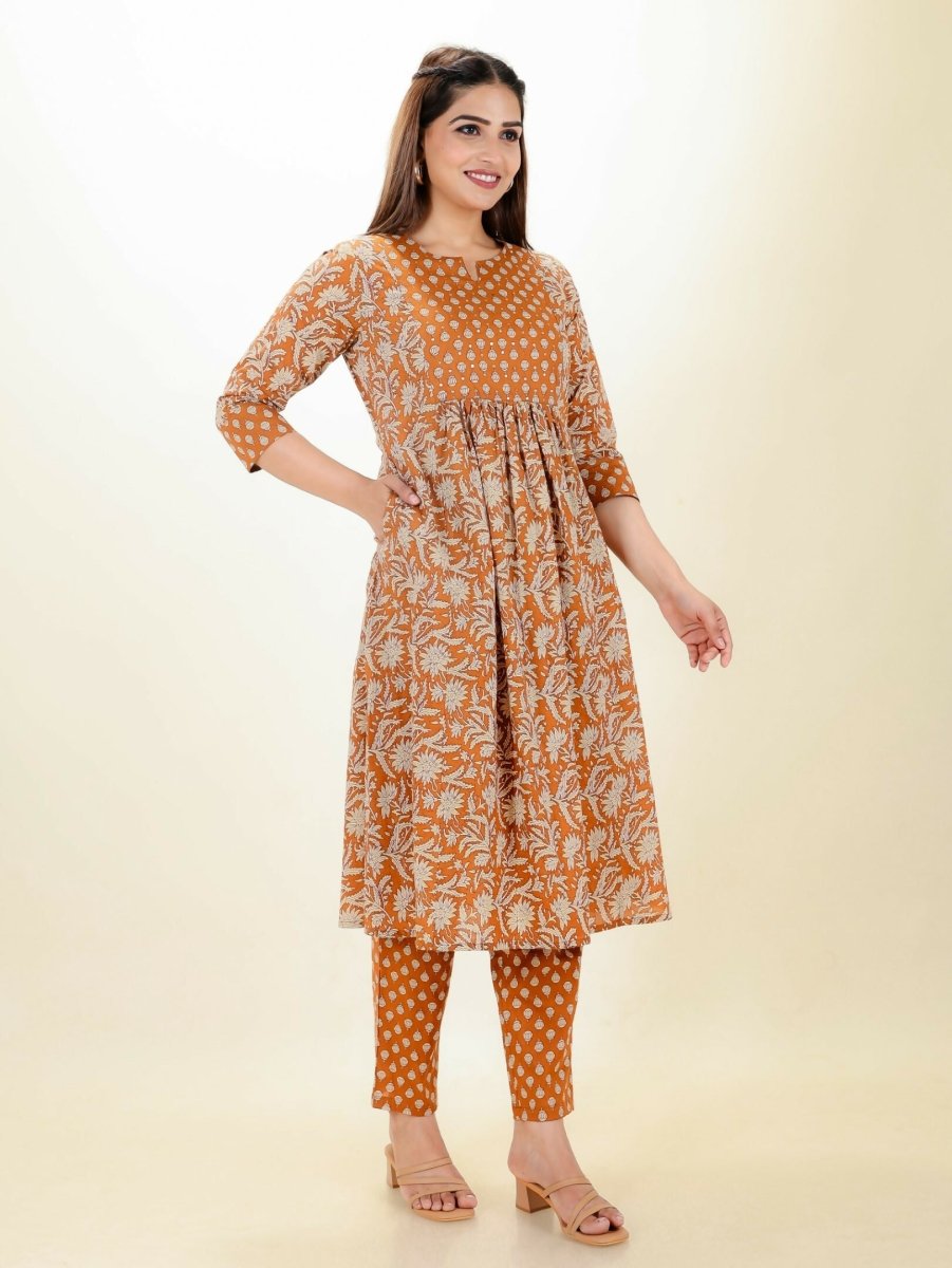 Aramya Orange Soft Cotton Floral Print Panelled Kurta Set for Women
