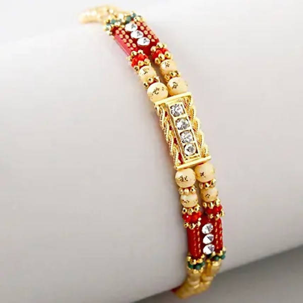 Dainty Kundan Rakhi And Kaju Rolls Box
