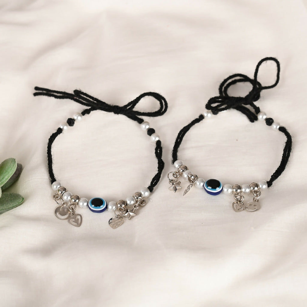NVR Women Set of 2 Black Evil Eye Rakhi With Roli Chawal