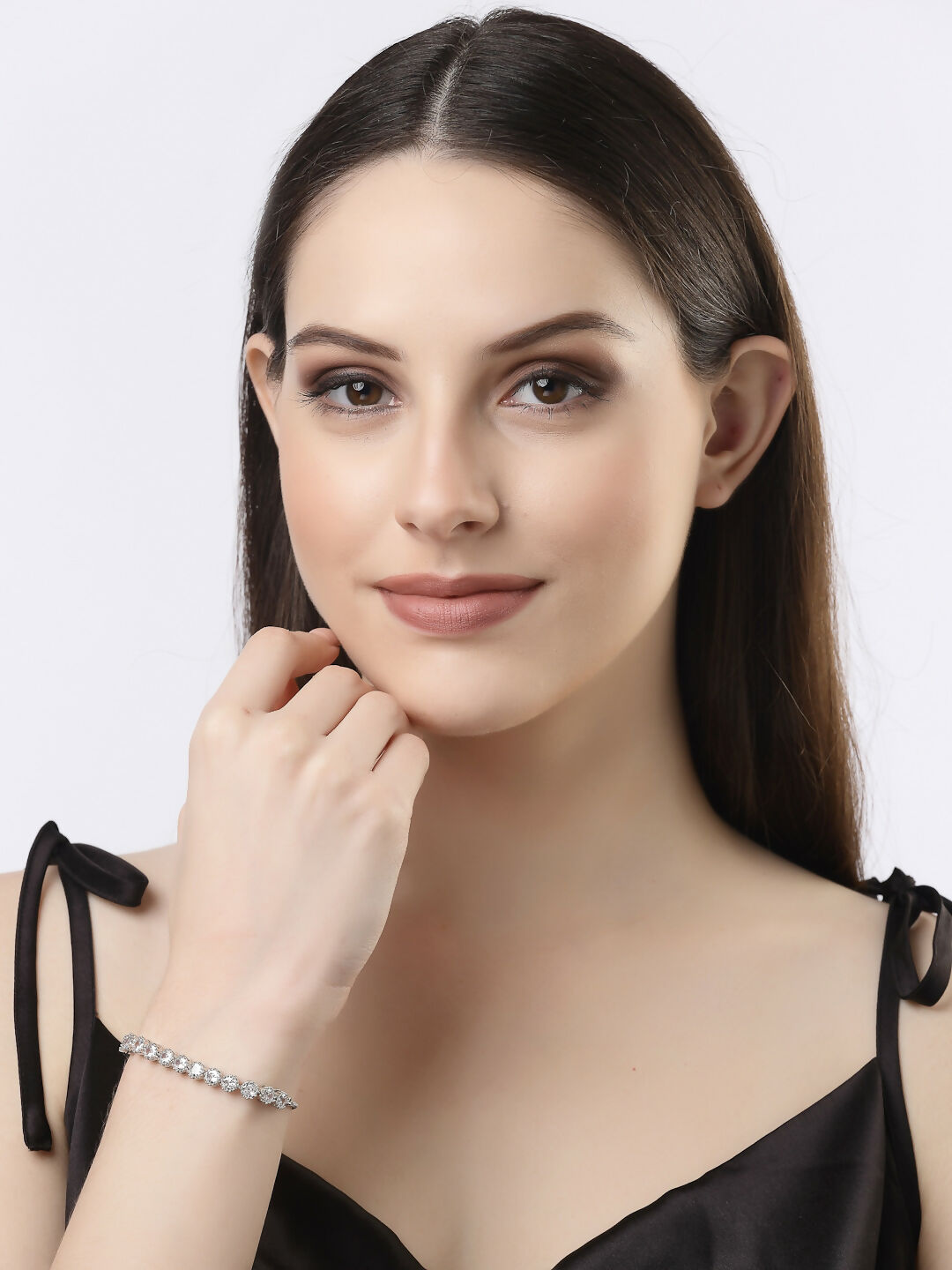NVR Women Silver-Plated Handcrafted American Diamond Link Bracelet