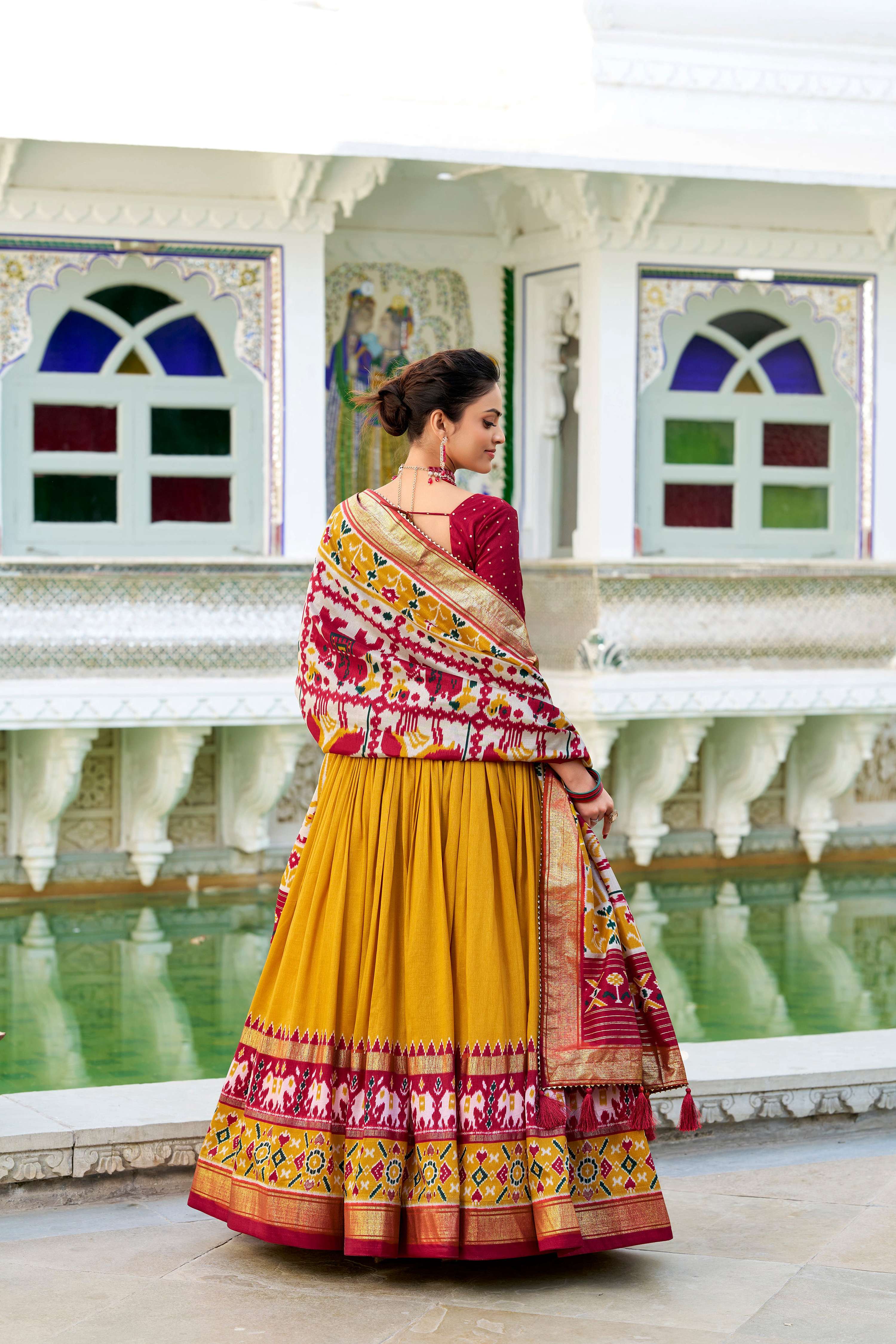 Evanik Mustard Traditional Style Tussar Silk Patola Print With Foil Work Unstitched Lehenga Choli
