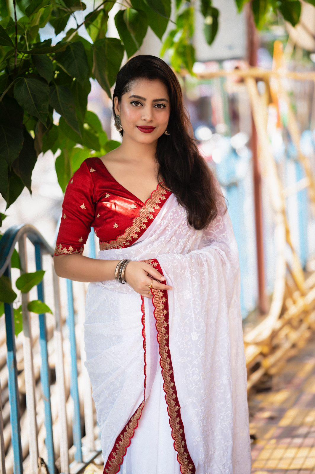 White Pure Georgette Woven Design Saree with Unstitched Blouse - A2M