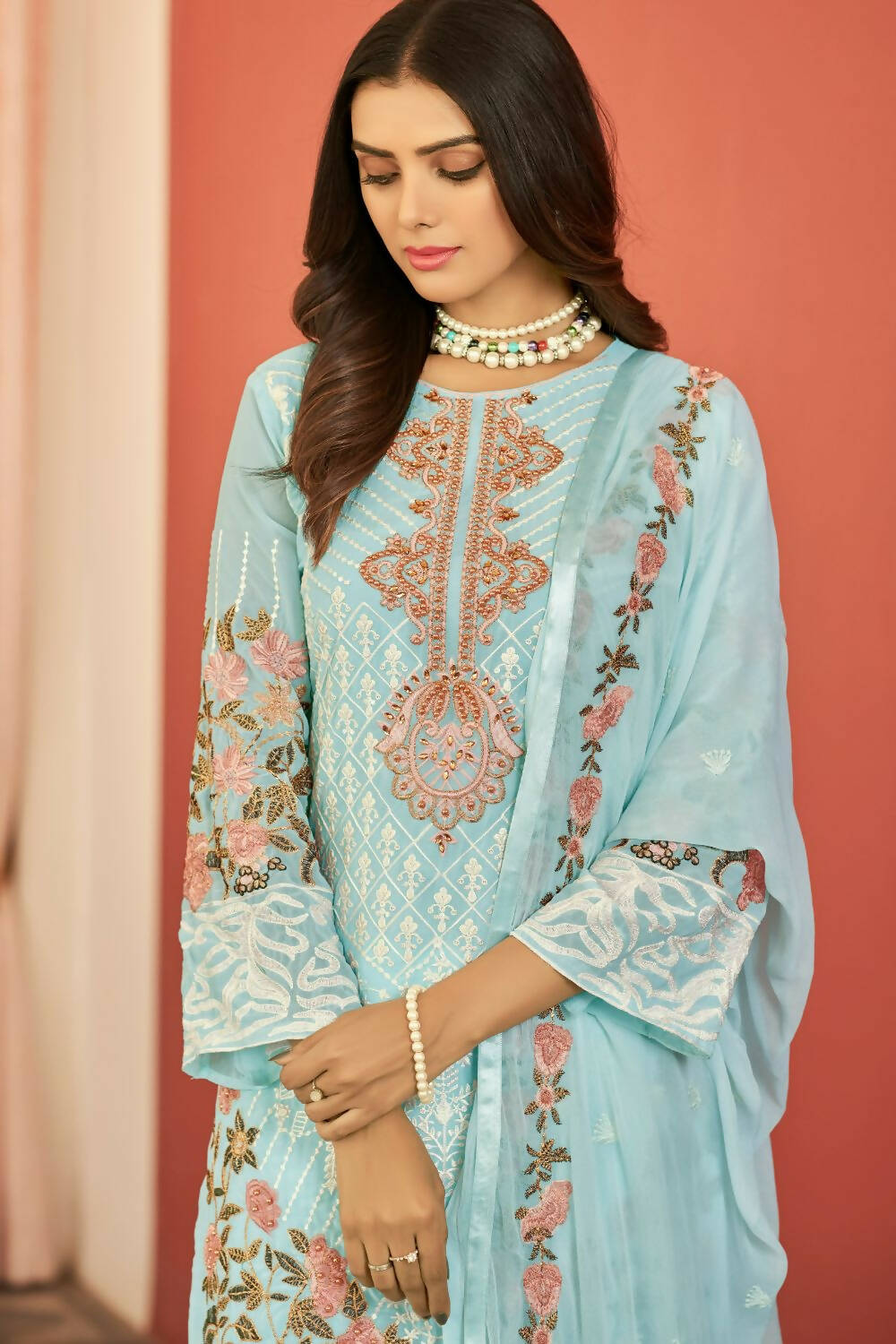 Sky Blue Heavy Faux Georgette Embroidered Semi Stitched Suit - Dhvani