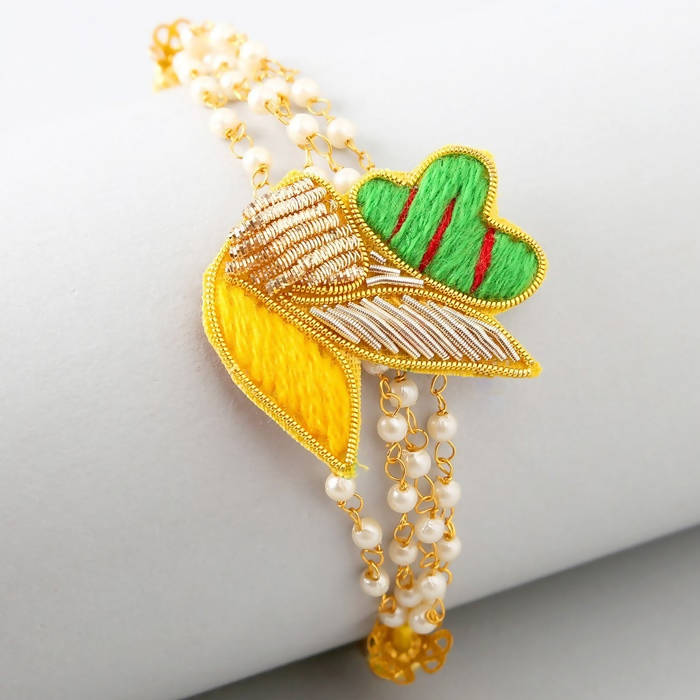 Meenakari Glimming Rakhi & Kaju Rolls Box