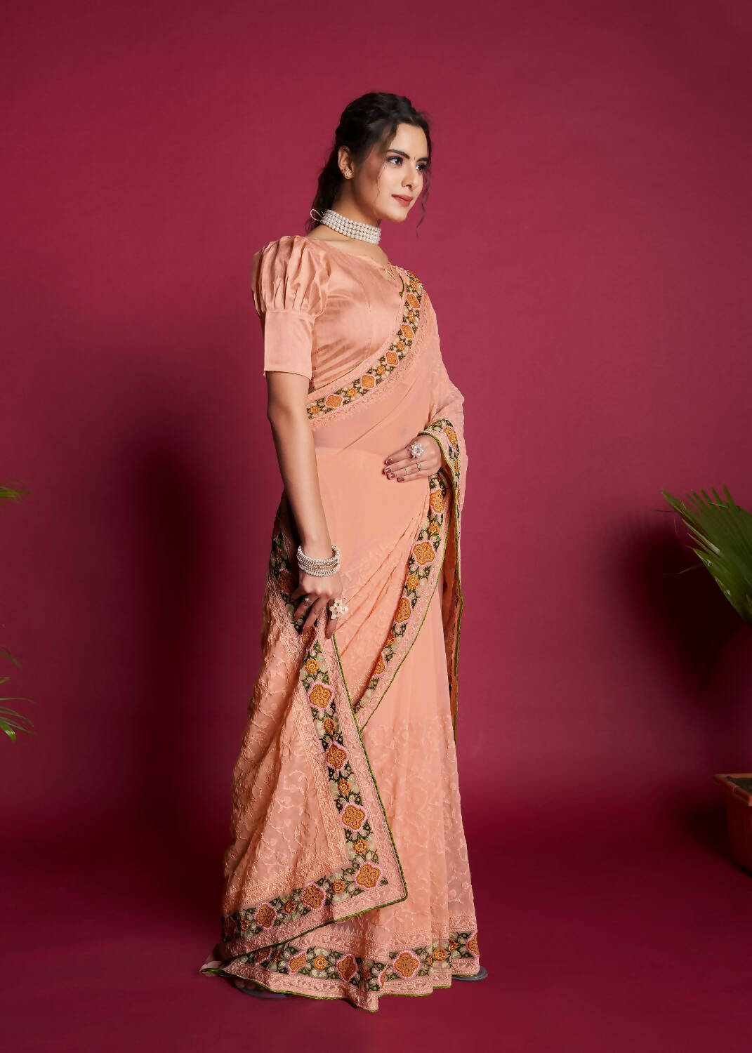 Vamsee Peach Georgette Designer Saree