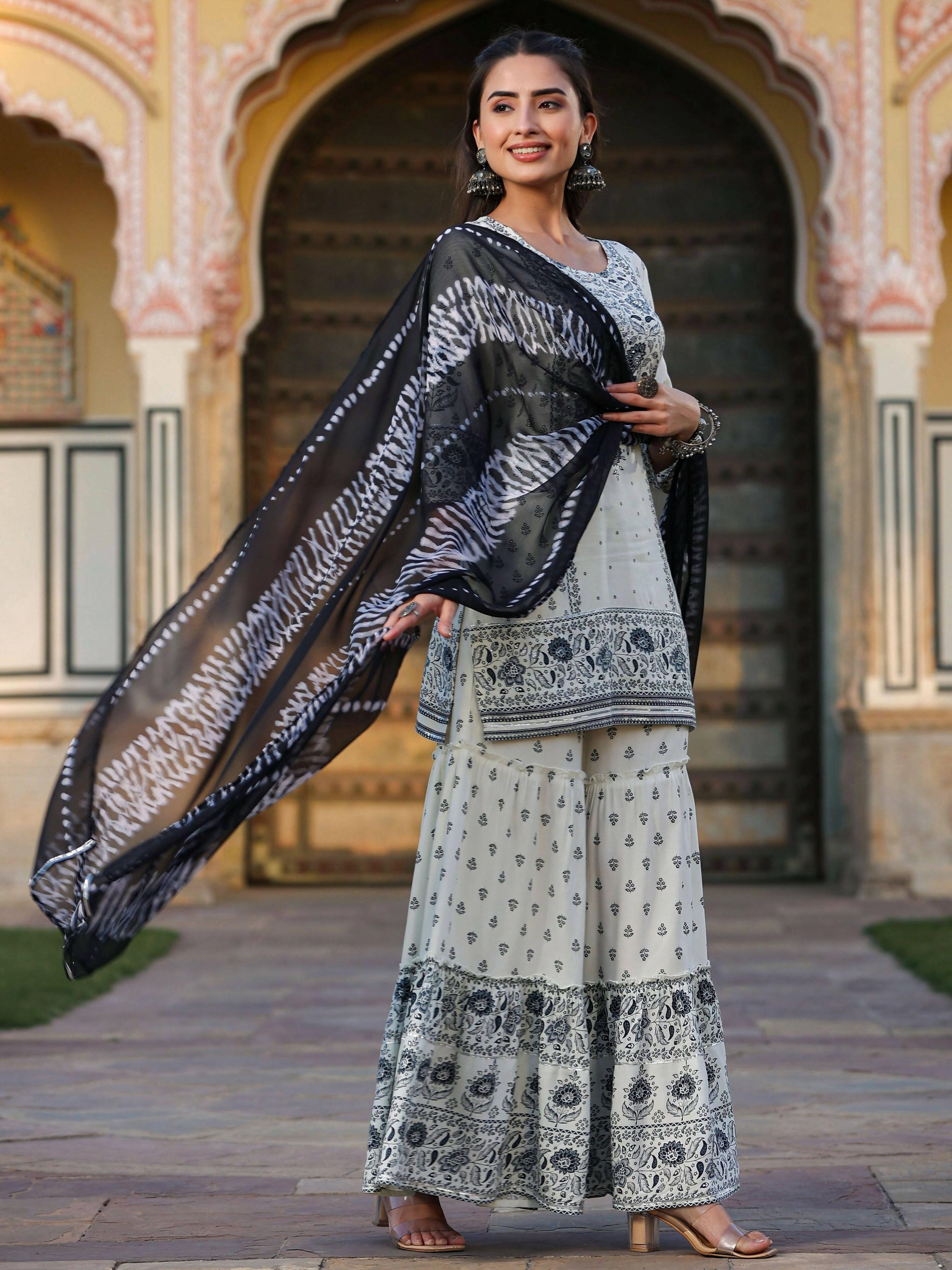 Juniper Women's Off White Rayon Floral Placement Kurta With Sharara And Dupatta Set