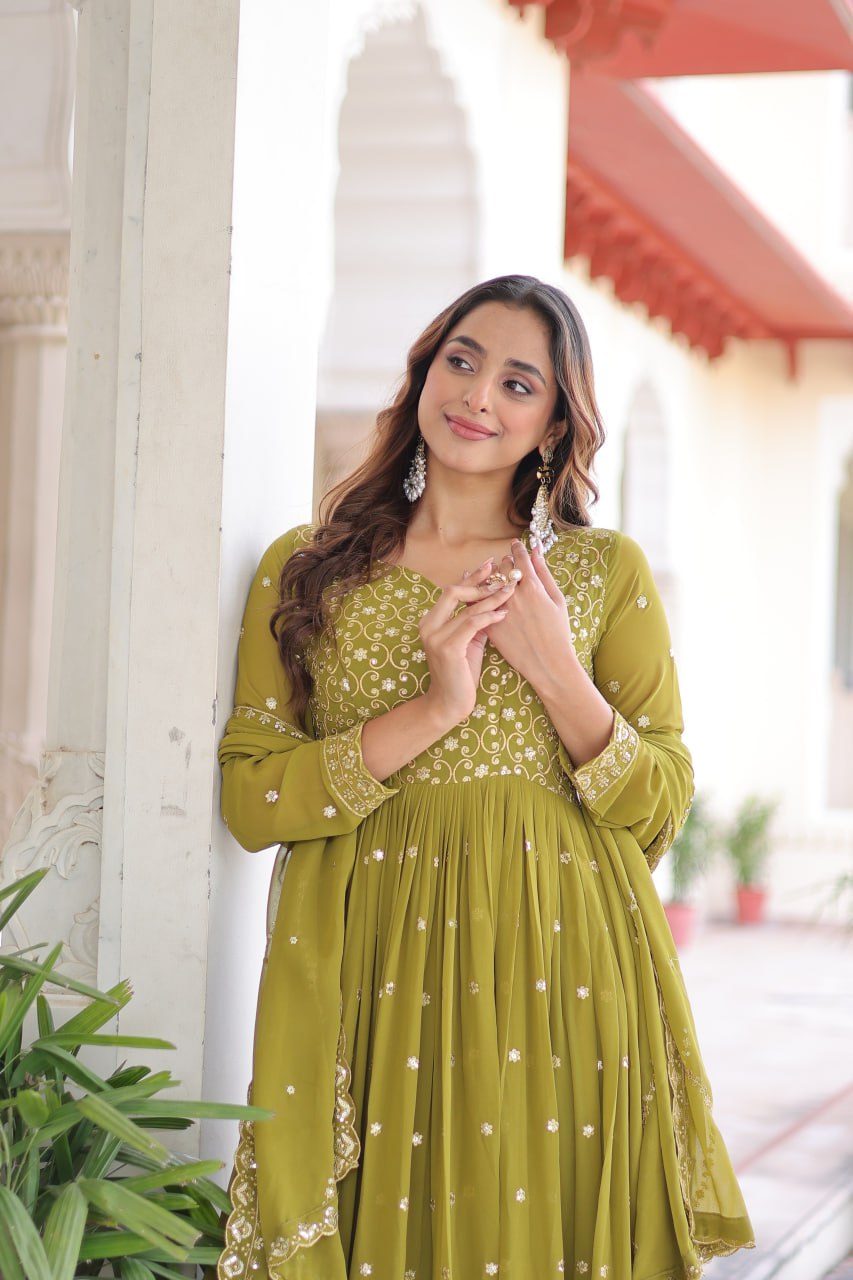 Evanik Mehendi Faux Georgette with Rich Sequins & Zari Embroidered work Gown